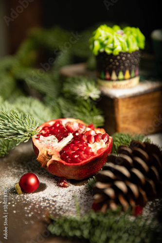 christmas cookies and decorations pomegranate and pine cones