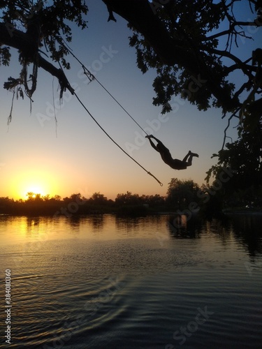 sunset on the river with bungee photo