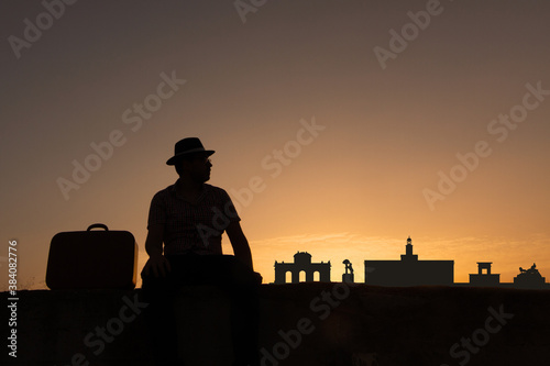 man next to silhouette skyline of madrid city in spain