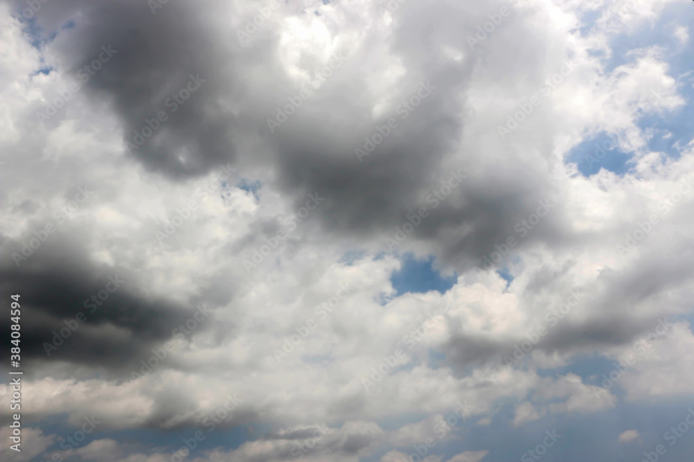 Blue sky background with big clouds