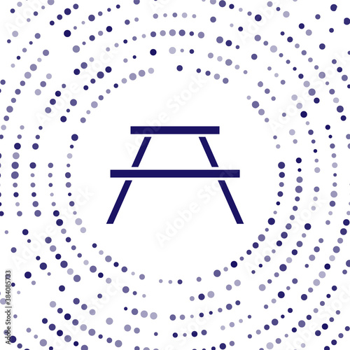 Blue Picnic table with benches on either side of the table icon isolated on white background. Abstract circle random dots. Vector.