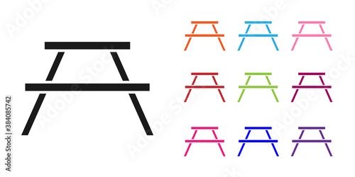 Black Picnic table with benches on either side of the table icon isolated on white background. Set icons colorful. Vector.