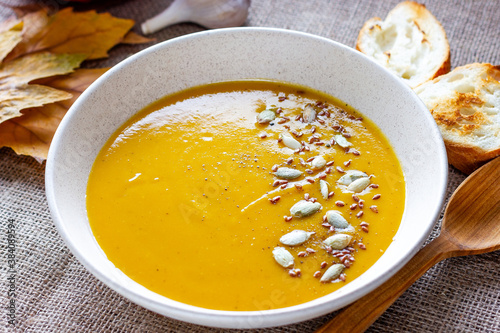 Healthy, vegan food. Pumpkin soup with pumpkin seeds