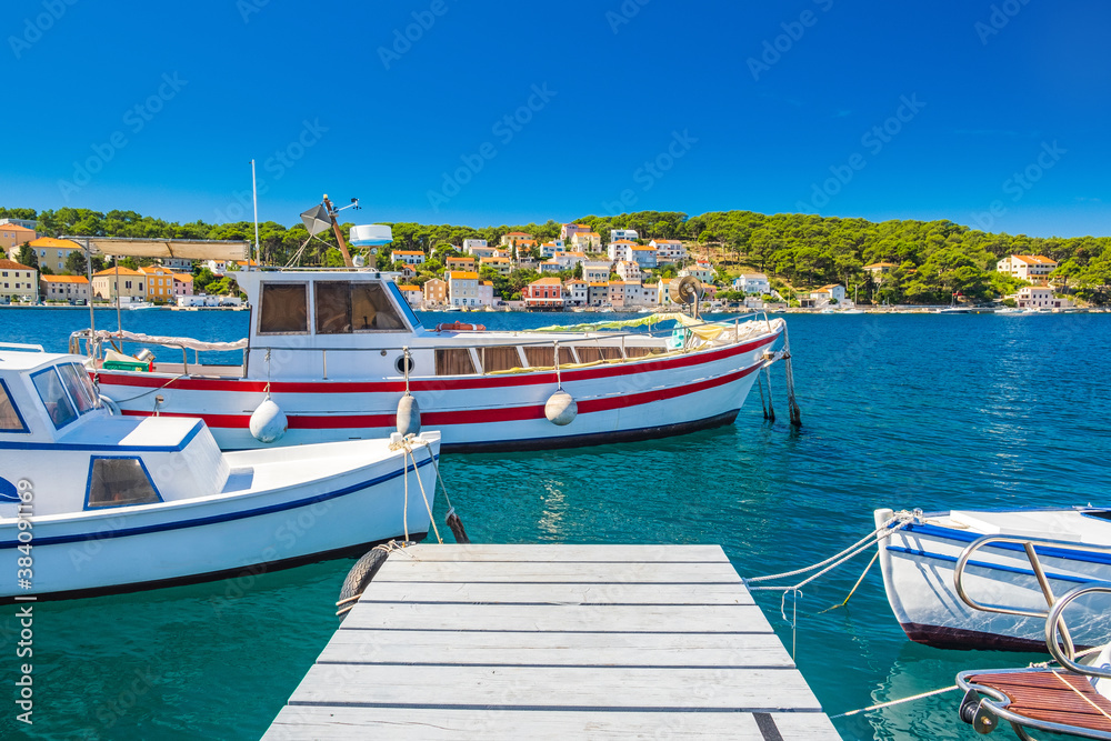 Boats on waterfront in town of Mali Losinj on the island of Losinj, Adriatic coast in Croatia