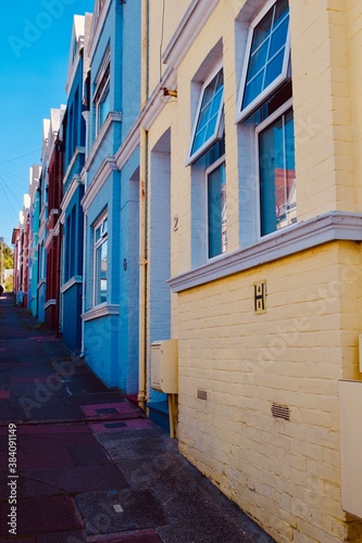 The colourful neighbourhood, Blaker Street, in Brighton. Famous for its colourful houses and the seaview © T