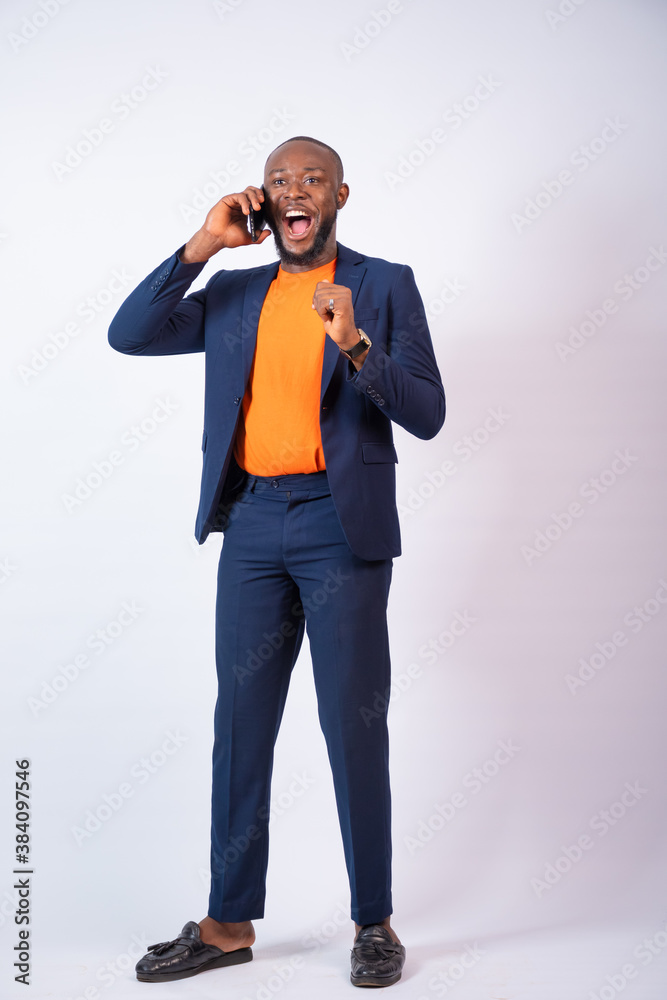 excited business man making a phone call excited business man making a phone call