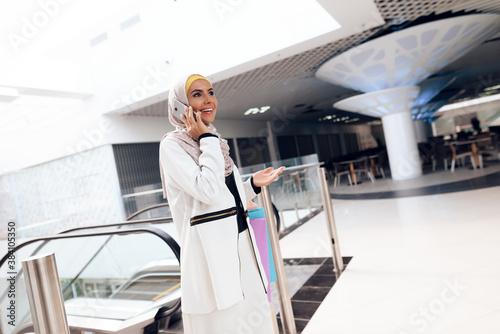 Young Arabian Woman Using Smartphone on Shopping.