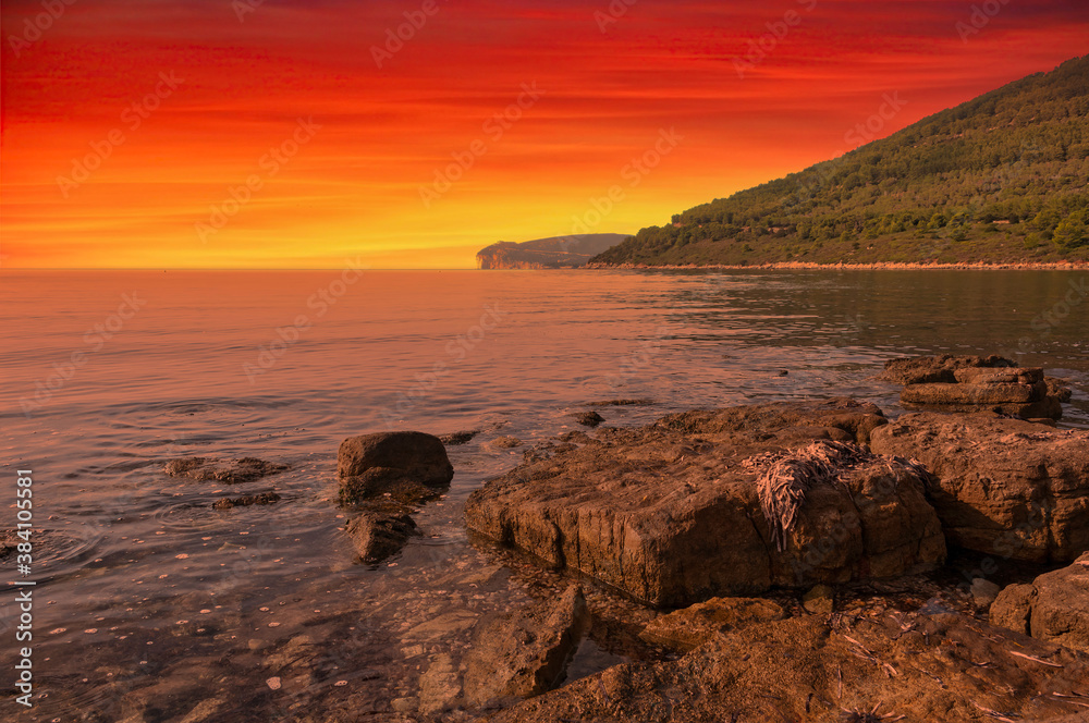 Landscape of Capo Caccia coast at dramatic sunset