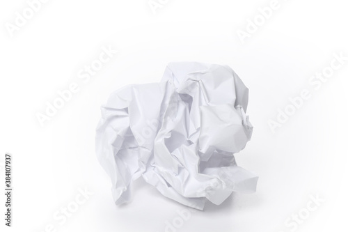 close up on a crumpled paper sheet ball isolated on white background with copy space for your text