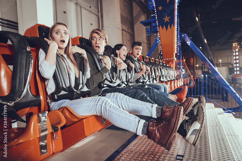 Couples sit on scary attraction and scream in fear