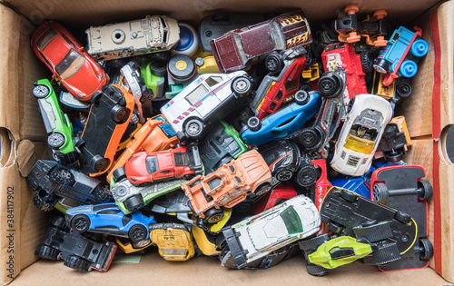 Obraz na płótnie Overhead view on colorful car toys. Many multi-colored.