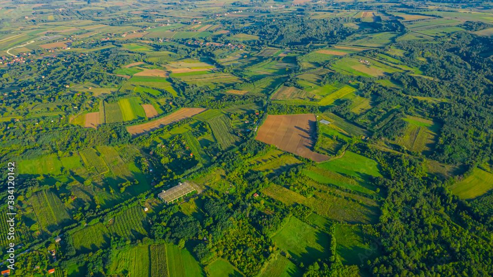 Fototapeta premium Aerial view of over green landscape