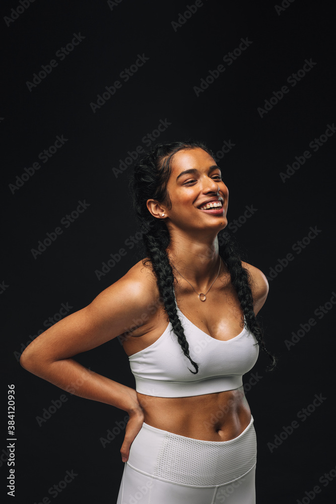Obraz premium Fit woman relaxing after workout