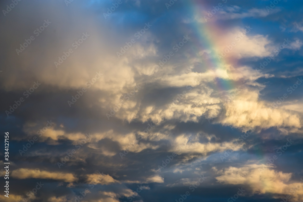 Storm cloud and rainbow for background