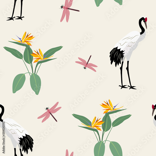 Seamless vector illustration with birds cranes, dragonflies and tropical flowers strelietzia.