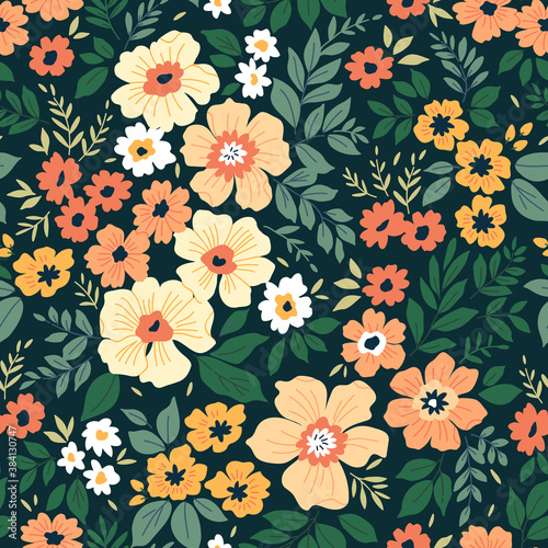 Vintage floral background. Seamless vector pattern for design and fashion prints. Flowers pattern with small yellow-orange flowers on a dark green background. Ditsy style.