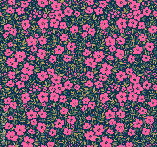 Elegant pattern in small flowers. Liberty style. Floral seamless background. Ditsy print. Vector texture. A bouquet of spring flowers for fashion prints.