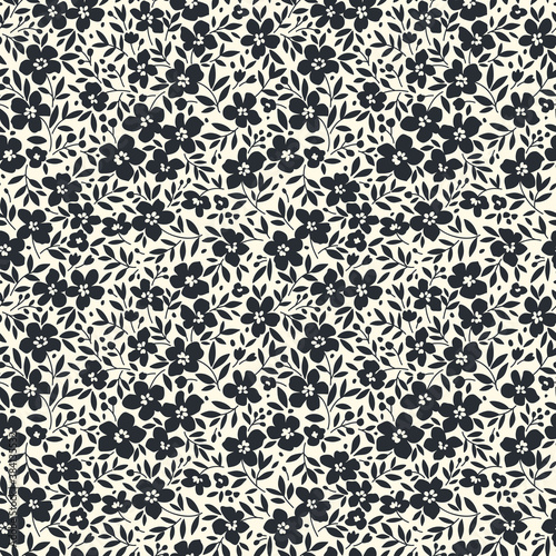 Trendy seamless vector floral pattern. Endless print made of small black flowers. Summer and spring motifs. White background. Vector illustration.