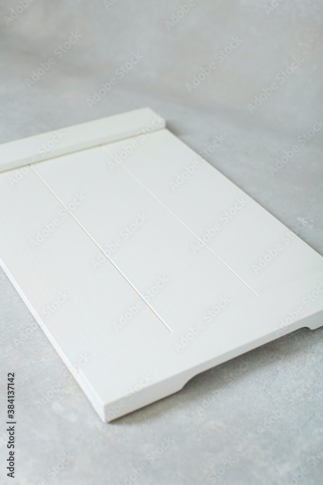 Fototapeta premium white cutting board on rustic handwritten background