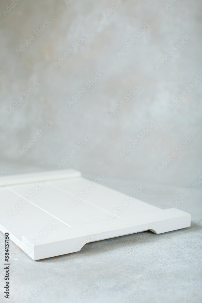 Fototapeta premium white cutting board on stylish rustic handwritten background