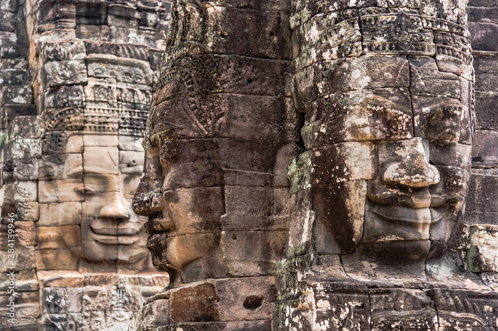 Three overlaping faces in Angkor Wat, Cambodia