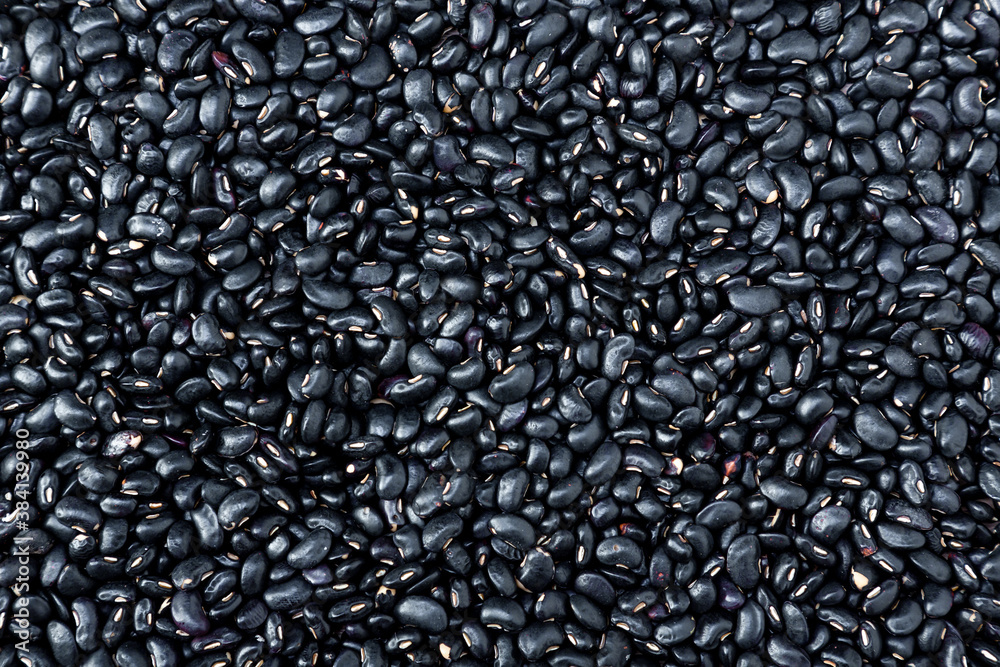 Black bean on background. top view. Black turtle beans are good for soup and stew. Fresh organic natural beans. Black bean on background. top view. Black turtle beans are good for soup and stew. Fresh organic natural beans.