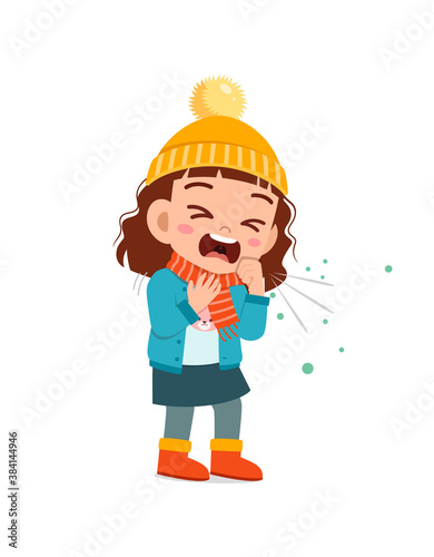 sad cute little kid cough and wear jacket in winter season. child feeling sick wearing warm clothes