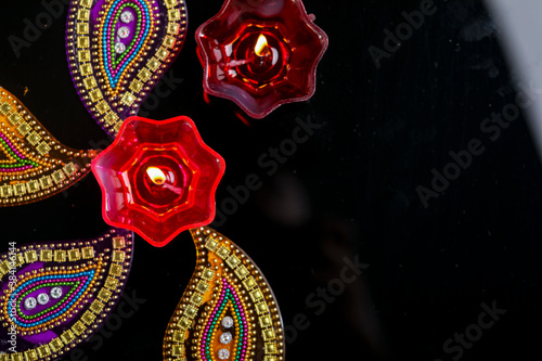 Indian festival diwali , Colorful lamps of oil on dark background