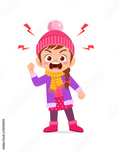angry cute little kid scream and wear jacket in winter season. child shout wearing warm clothes