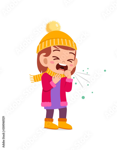 sad cute little kid cough and wear jacket in winter season. child feeling sick wearing warm clothes