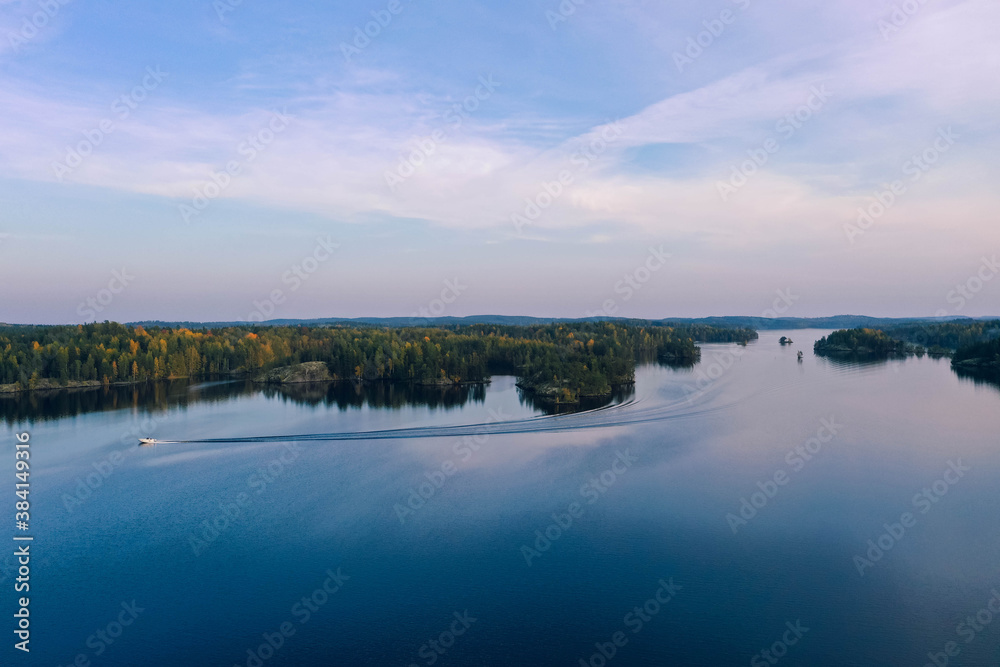 Drone shot of islands, lake and forest in autumn in Heinola, Finland Drone shot of islands, lake and forest in autumn in Heinola, Finland