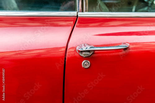 Red 60s classic car door handle