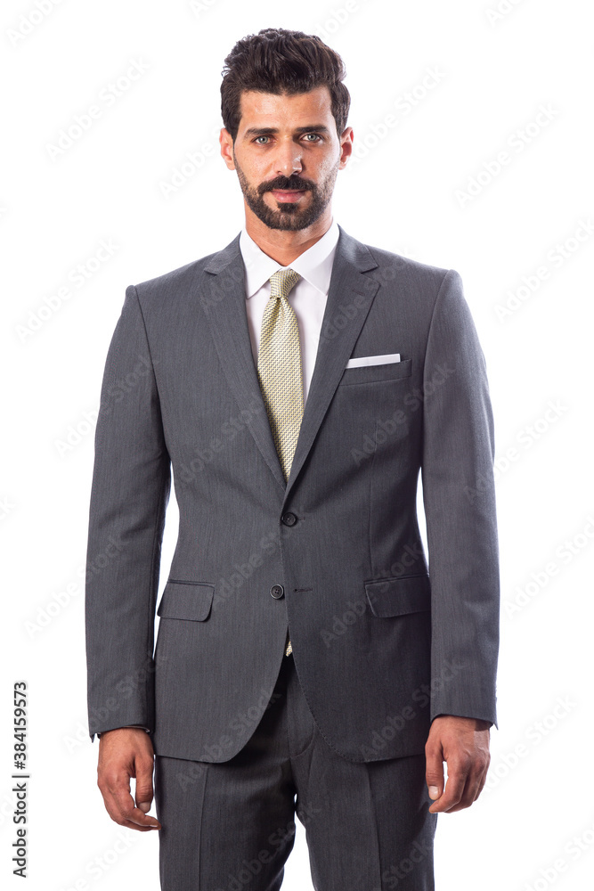 A young man wearing a black suit on a white background A young man wearing a black suit on a white background