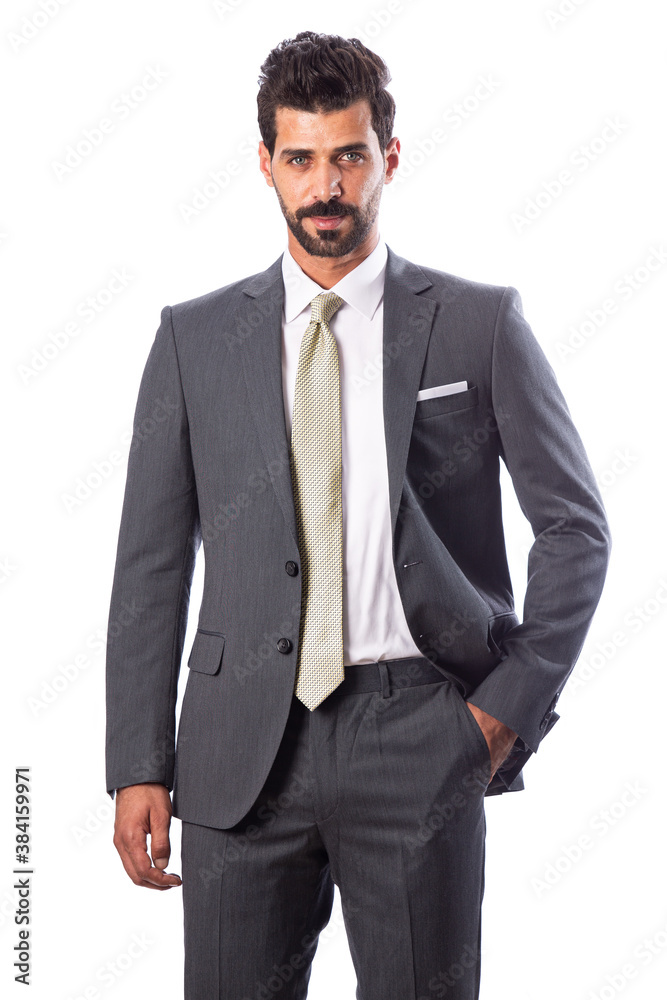 A young man wearing a black suit on a white background A young man wearing a black suit on a white background