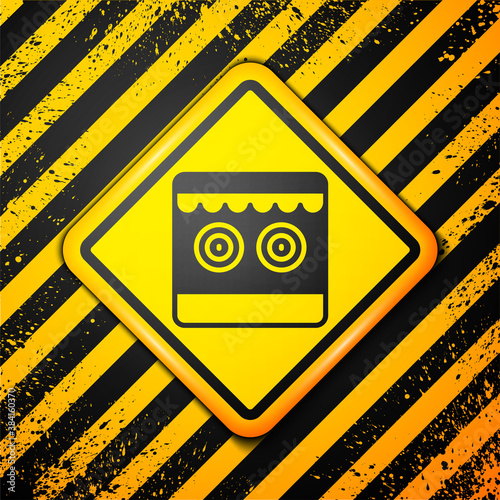 Black Shooting gallery icon isolated on yellow background. Warning sign. Vector.