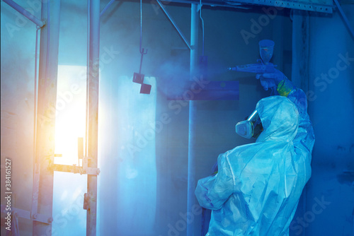 Powder painting of the product in a blue paint chamber.