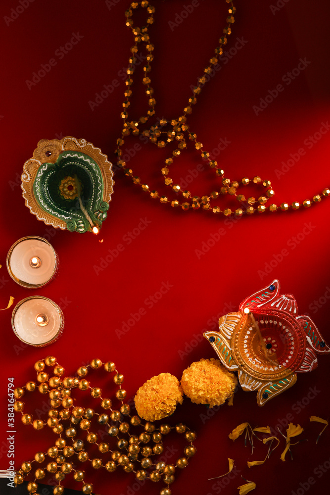 Naklejka premium happy diwali or happy deepavali greeting card made using a photograph of diya or oil lamp