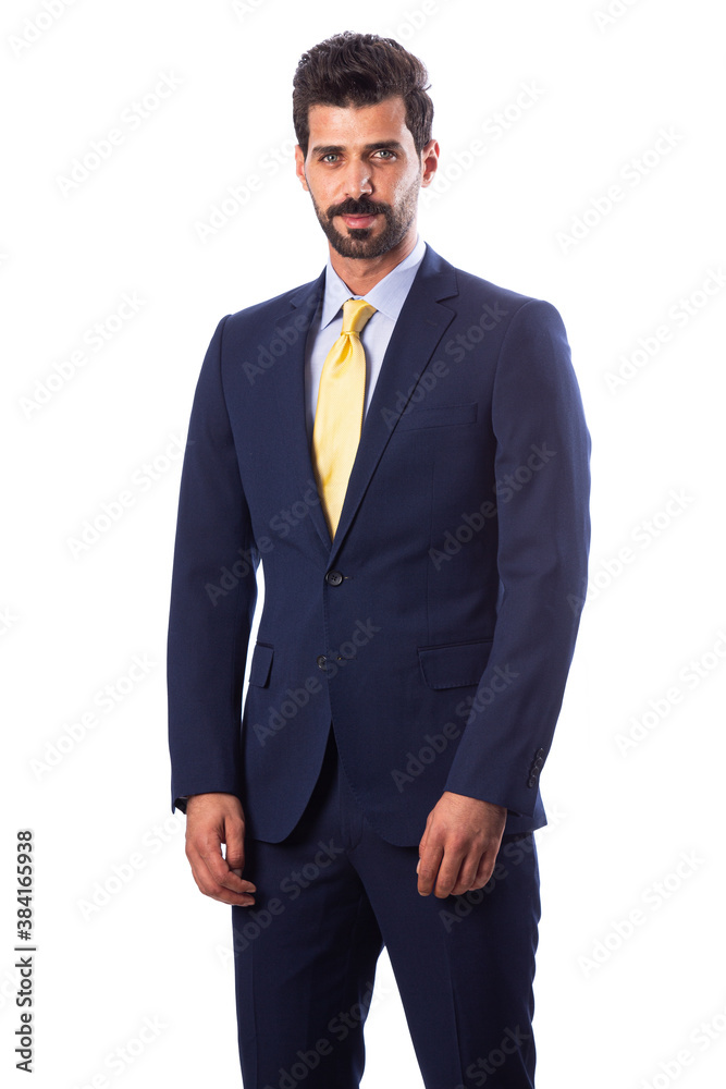 A young man wearing a black suit on a white background A young man wearing a black suit on a white background
