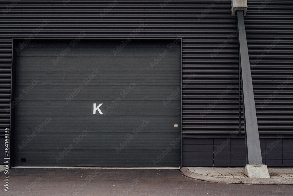 all black garage facade with the black door all black garage facade with the black door
