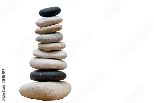 Stack of pebbles in an unstable state. A pyramid made of flat stones.