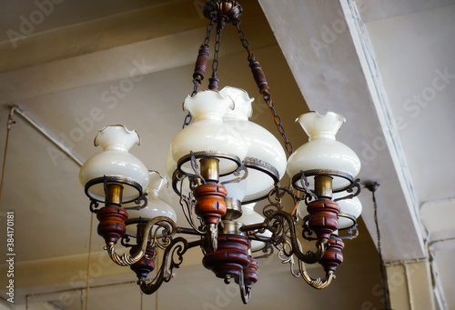 aged lamp hanging from the ceiling. vintage hanging lamp model. antique ceiling lamp 