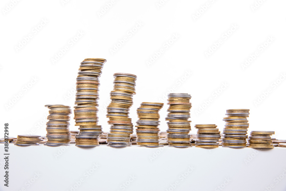collection of colorful metal coins isolated on white background, close view collection of colorful metal coins isolated on white background, close view