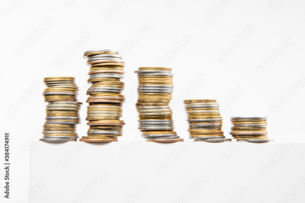 collection of colorful metal coins isolated on white background, close view collection of colorful metal coins isolated on white background, close view