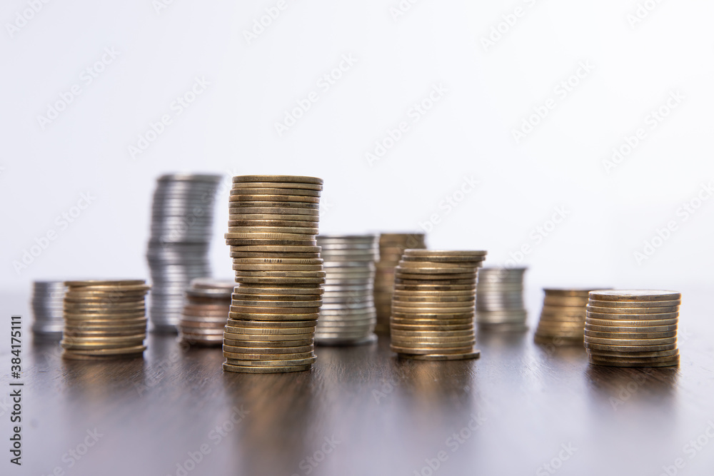 collection of colorful metal coins isolated on white background, close view collection of colorful metal coins isolated on white background, close view