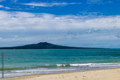 Surf rolling in on the beach. Takapuna Beach  Auckland  New Zealand