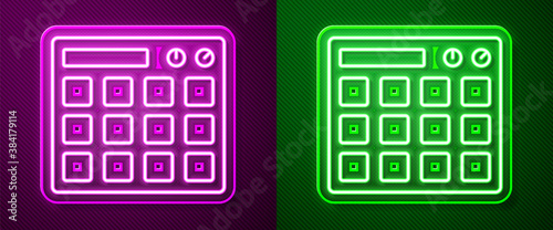 Glowing neon line Drum machine music producer equipment icon isolated on purple and green background. Vector.