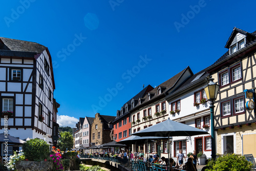 Bad Munstereifel/ Germany: View of the Historical Medieval City with the typical Half-timbered Houses and Blue Sky