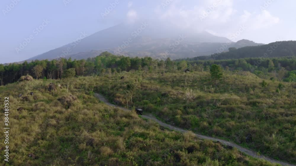 Beautiful off road vehicle with misty mountain Beautiful off road vehicle with misty mountain