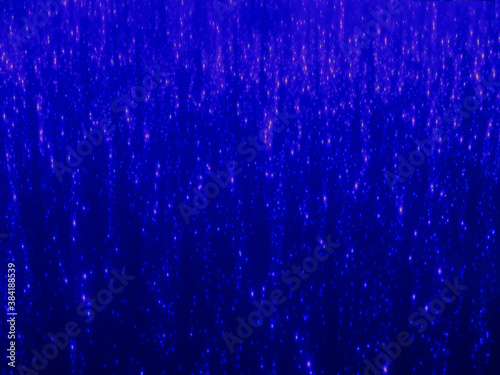 Christmas holiday background. Lots of blurry, glittering lights. Free space. Abstract blue bokeh light, background to create a festive atmosphere.