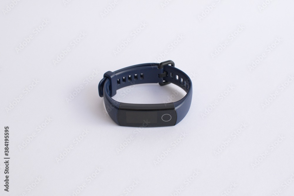 Blue fitness band on a white background